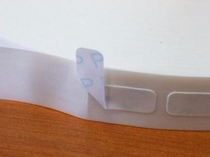 Double side adhesive label